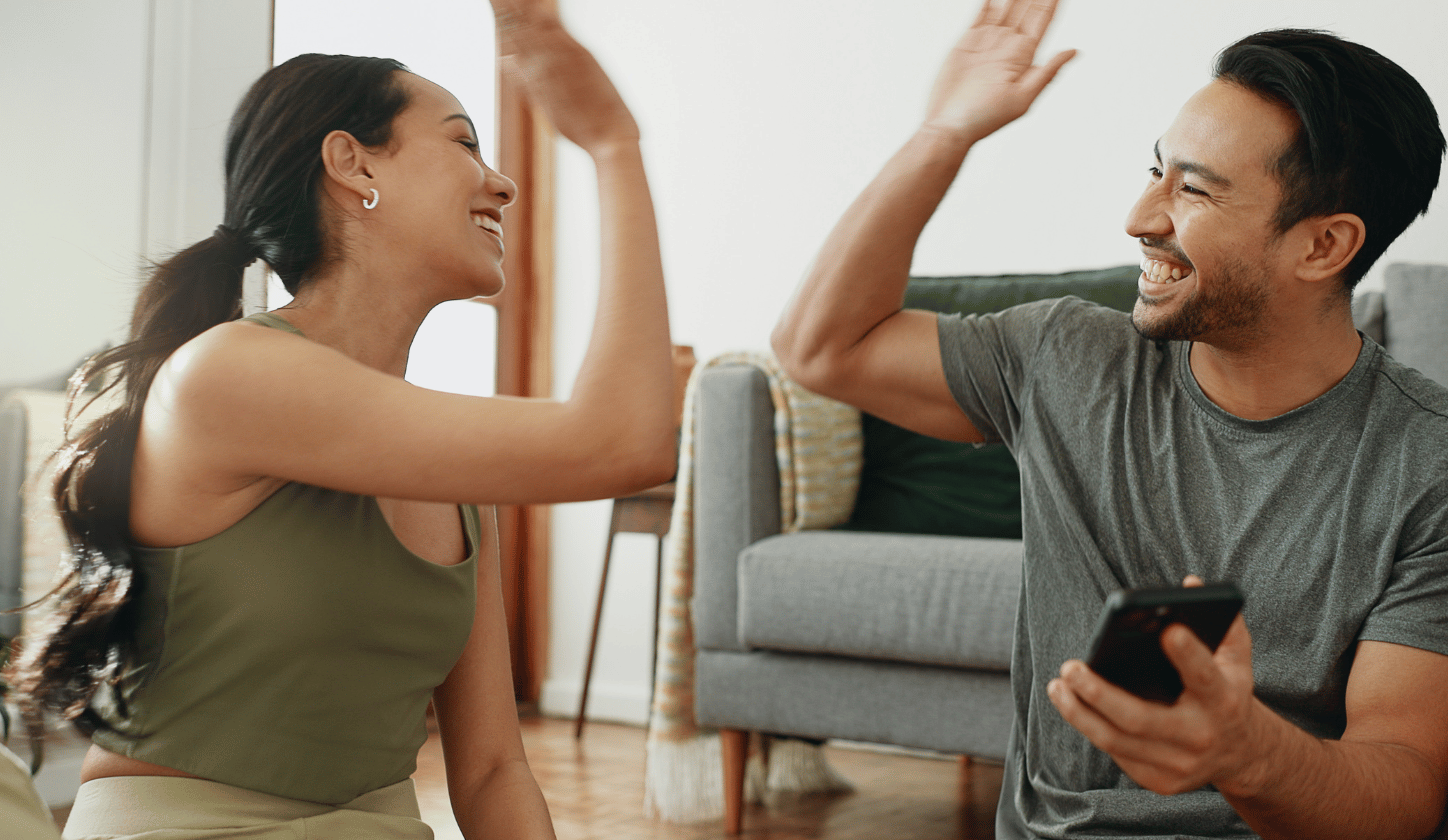 couple giving high five