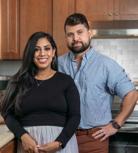 Young couple standing in the kitchen