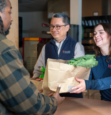 employees volunteering at food pantry