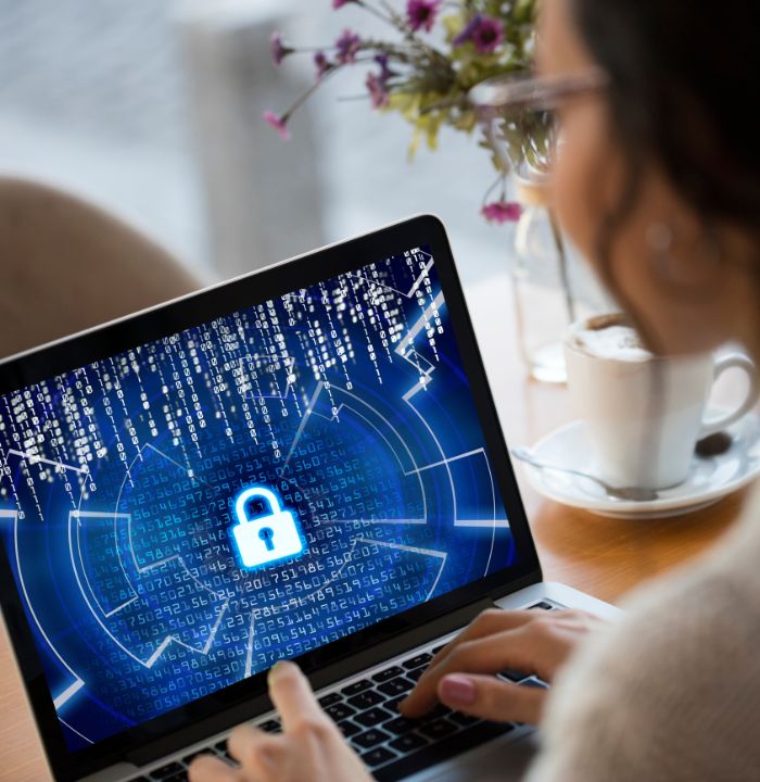 Women on computer with lock on screen