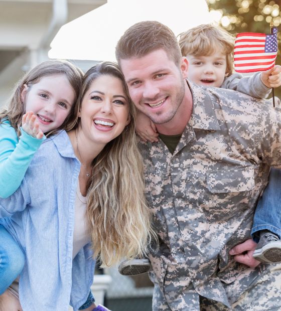 Military father with wife and children