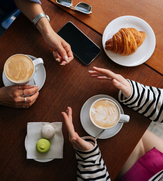 table full of coffee and dessert