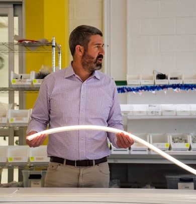 Man holding a lighting strip