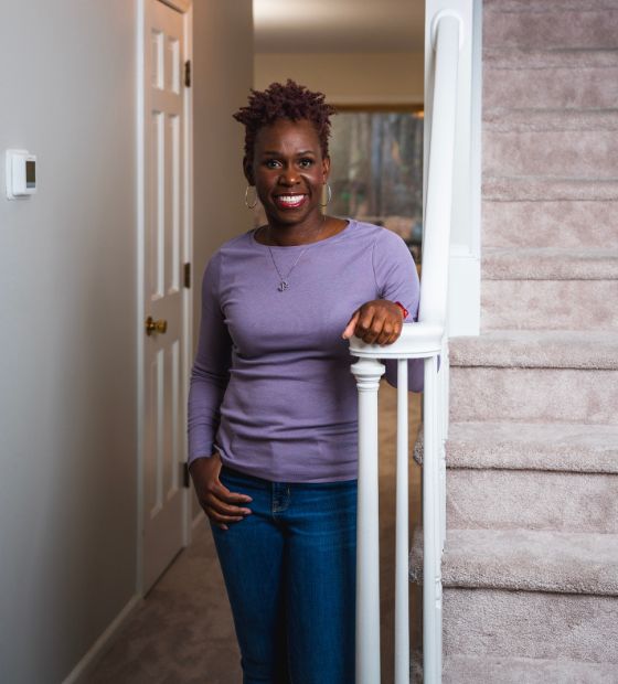 woman standing by stairs